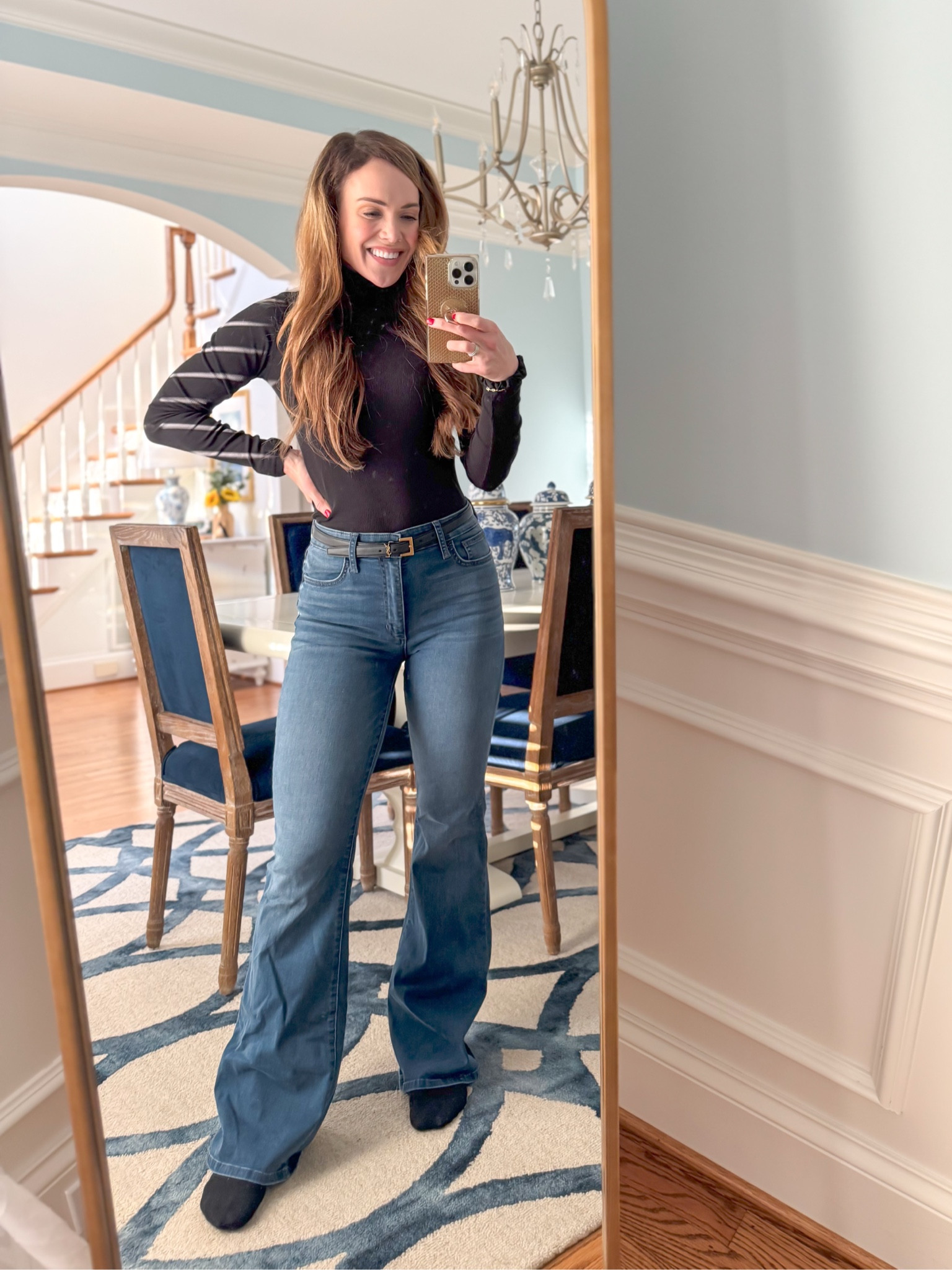 I’ve always loved jeans and a solid turtleneck as a put-together outfit. I’m in a small in the top, and a 27 in the flare jeans.

#LTKStyleTip