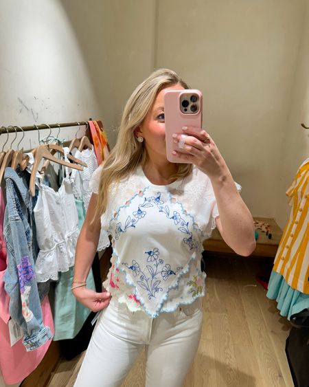 White embroidered top with the prettiest floral detailing! In the size XS, runs a little small. Also size up one size in the white straight leg jeans. They ran small for me as well! 🪻 #Anthropologie #Anthro #springstyle #springstyleinspo #outfitinspo #summerstyle #summerinspo #springbreakoutfits 

#LTKfindsunder100 #LTKSeasonal #LTKstyletip