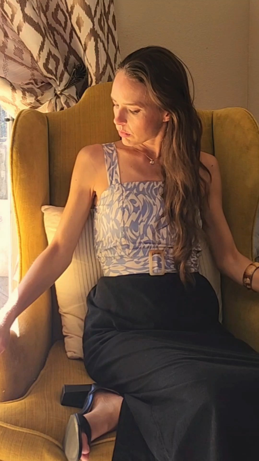 Summer style inspiration. Outfit inspo. Sundress. Black linen skirt. Wood bangle bracelet. Crop top. Delicate necklace. Patterned dress. Blue and white dress. Blue and white top 

#LTKSeasonal #LTKSaleAlert