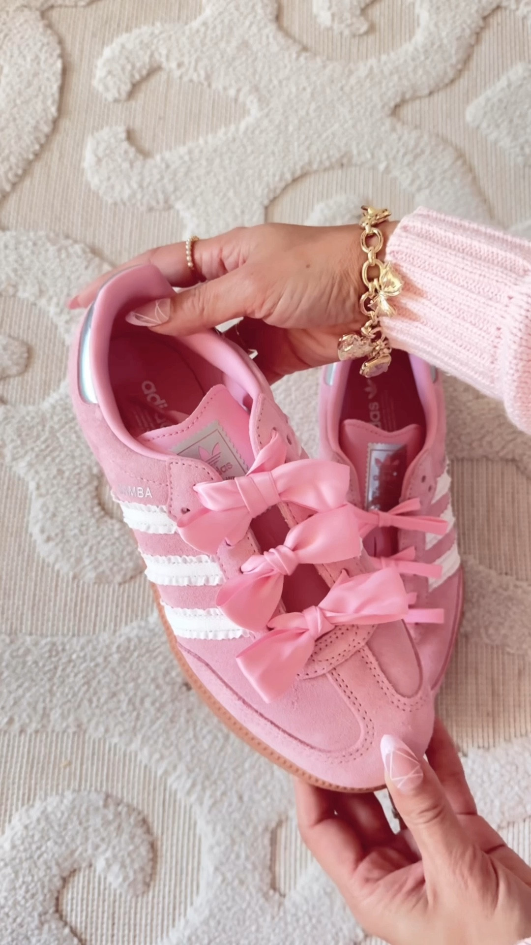 Pink ruffle sneakers with bow laces 

I’m a small size 5 so had to size down to 3.5

Kids Size/Women’s Size (Approx.)
Kids 3 = Women’s 4 – 4.5
Kids 4 = Women’s 5 – 5.5
Kids 5 = Women’s 6 – 6.5
Kids 6 = Women’s 7 – 7.5
Kids 7 = Women’s 8 – 8.5
Kids 8 = Women’s 9 – 9.5
Kids 9 = Women’s 10 – 10.5
