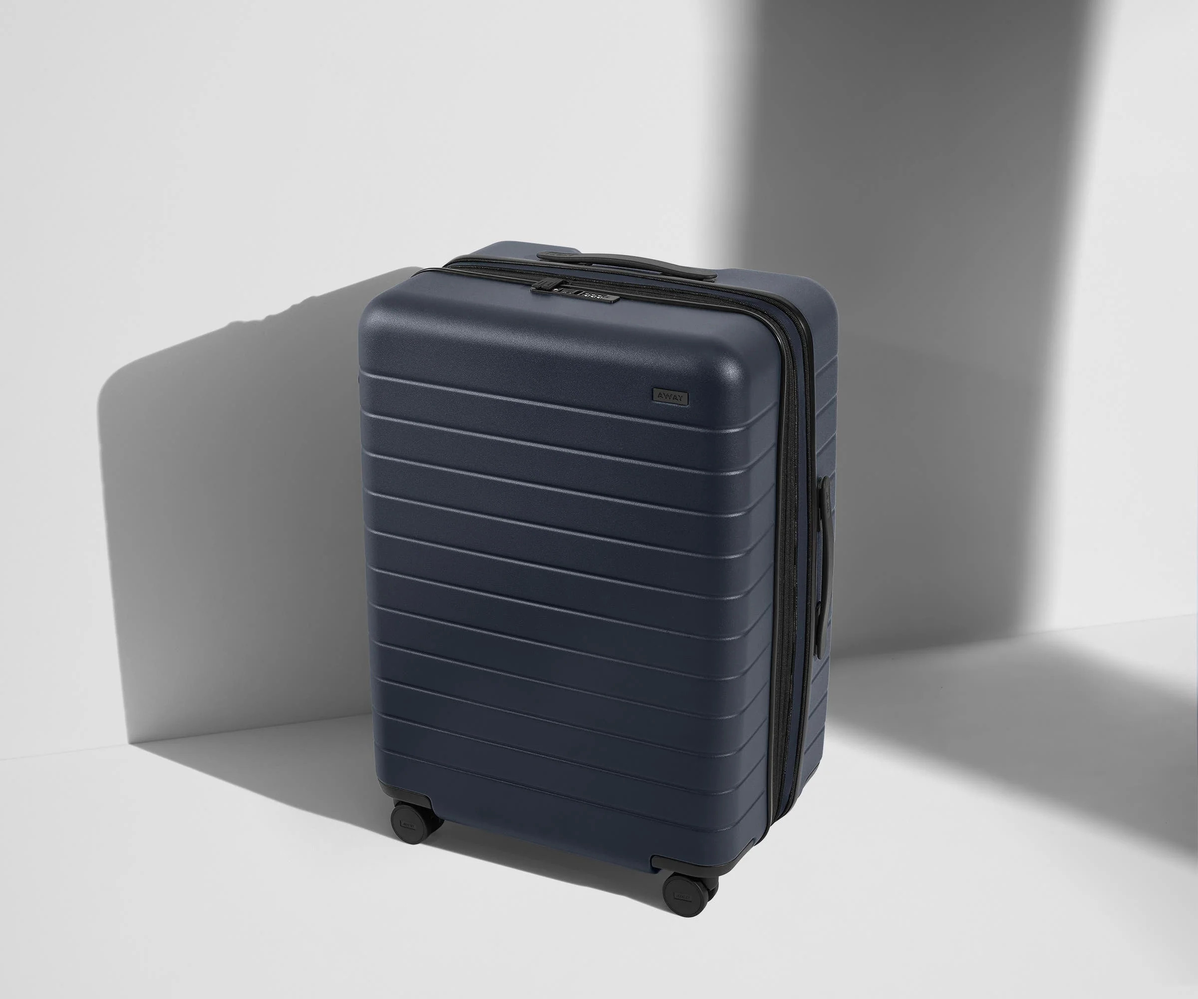 Expandable Medium Suitcases: Navy Blue | Away | Away