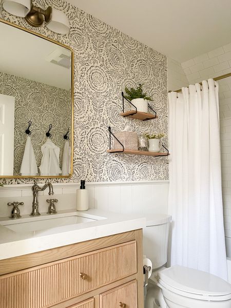 Wallpaper, shelves, vanity mirror and sconce, shower curtain, bathroom essentials 

#LTKhome #LTKstyletip #LTKfindsunder100