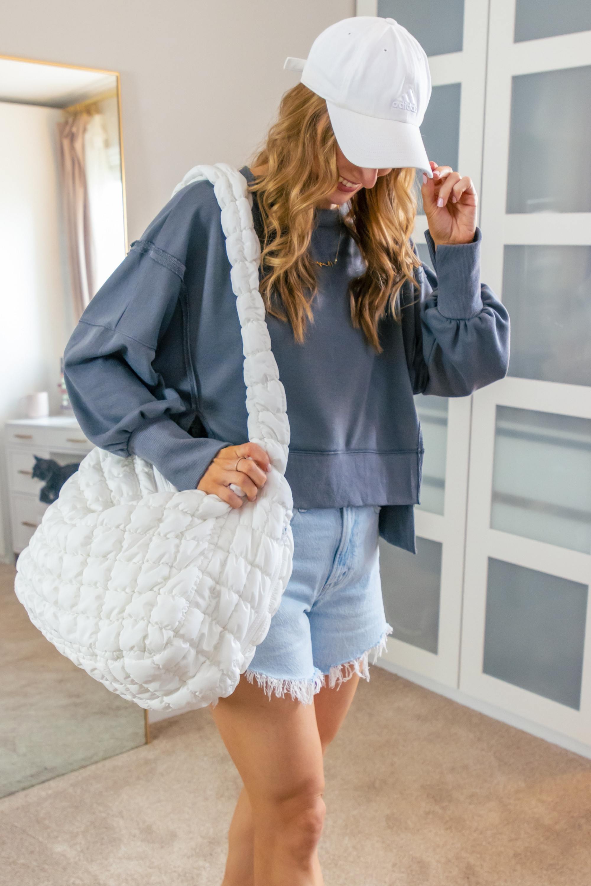 Stylish and cozy! Loving this oversized cropped pullover paired with denim shorts and a cute baseball cap. Perfect for a relaxed day out. I'm in a size medium in the dark gray color option in the pullover.
 

 #LTKootd #LTKSeasonal #LTKOver40
