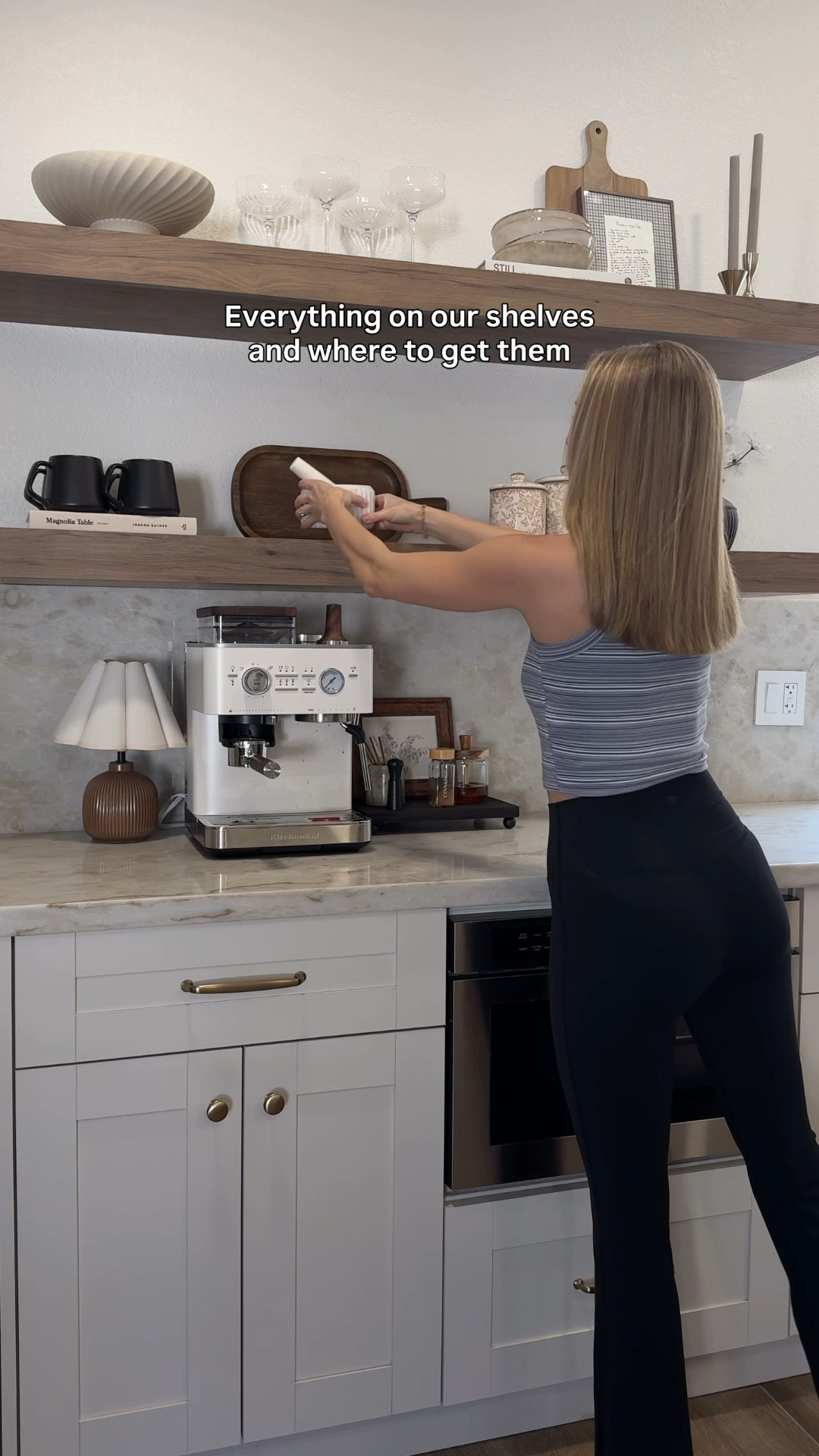 Everything you see on our kitchen shelves and exactly where I got it 🤎

Top shelf 
• footed bowl - Amazon 
• coupe glasses - Target
• book - Amazon
• ceramic bowls - Amazon 
• cutting board - Hobby Lobby 
• framed recipe - DIY project! 
• candle holders - Anthropologie 
• taper candles - Target 

Bottom shelf 
• cookbook - Amazon 
• mugs - Amazon 
• serve board - Target 
• pestle & mortar - Anthropologie 
• canister - Magnolia 
• vase - Target 
• flowers - Hobby Lobby 

Follow along for more organic modern home styling inspiration. 

#kitchen #kitchendecor #home #decor #homedecorfinds 

#LTKHome #LTKSaleAlert