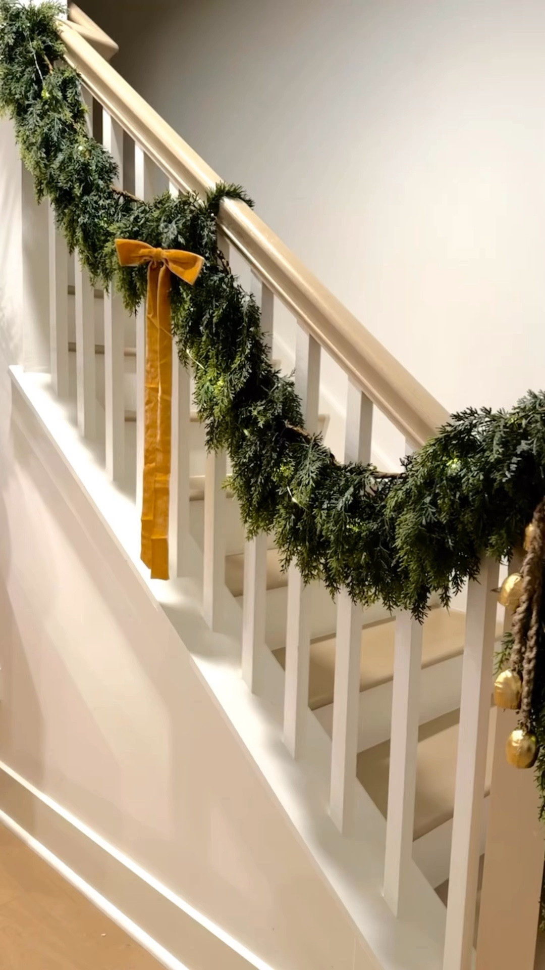 “Holiday vibes are in full swing! 🎄✨ I kept it simple yet elegant with this garland staircase design—complete with warm white twinkling lights, a velvet ribbon, and gold accents for a festive touch. It’s the perfect way to make your home feel cozy and magical this season.

Tap to shop similar holiday decor and recreate this look in your home! You can still get this garland before Christmas! 

#LTKSeasonal #LTKCyberWeek #LTKHoliday