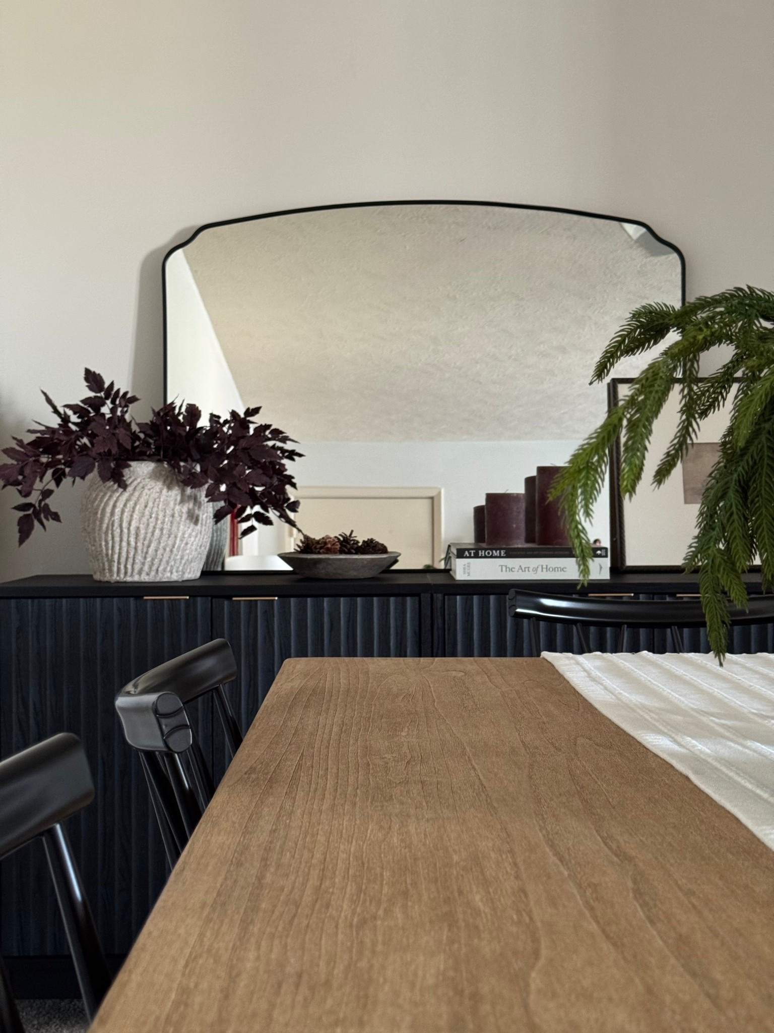 Dining room table, toscana table, pottery barn dining table, black metal chairs, beige vase, plum stems, marble bowl, pinecones, coffee table books, sideboard, dining room styling 

#LTKSeasonal #LTKSaleAlert #LTKHoliday