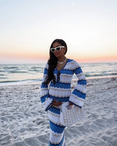 Vacation beach outfit 
Shopbop blue and white knit dress wearing an XS
Seashell bag
Seashell necklace



#LTKItBag #LTKFindsUnder100 #LTKTravel