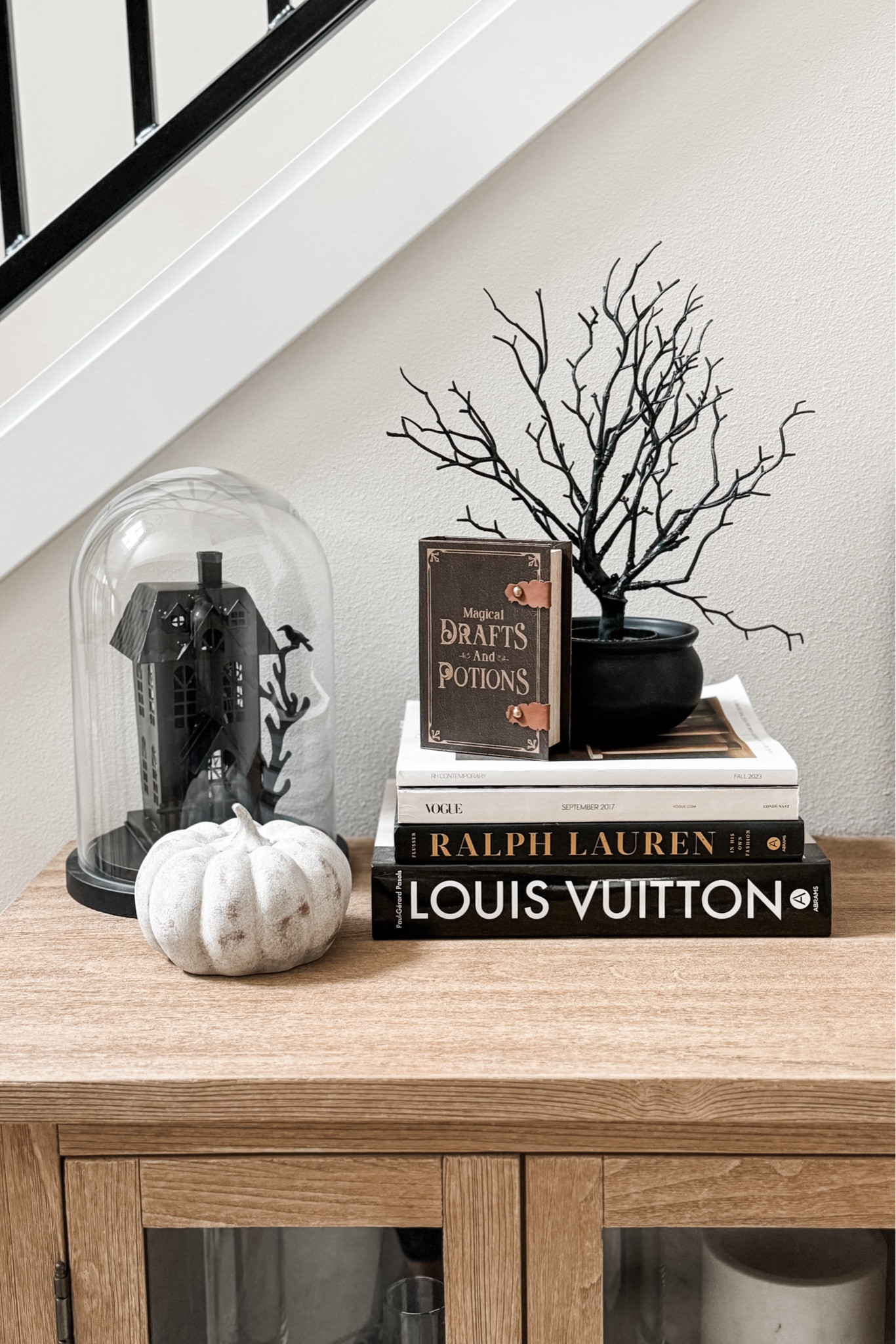 A little festive vignette on one end of the buffet in our entryway. 🐦‍⬛

*My exact tree was a Target Bullseye's Playground purchase last year, but l've linked similar options

#LTKHalloween #LTKHome #LTKSeasonal