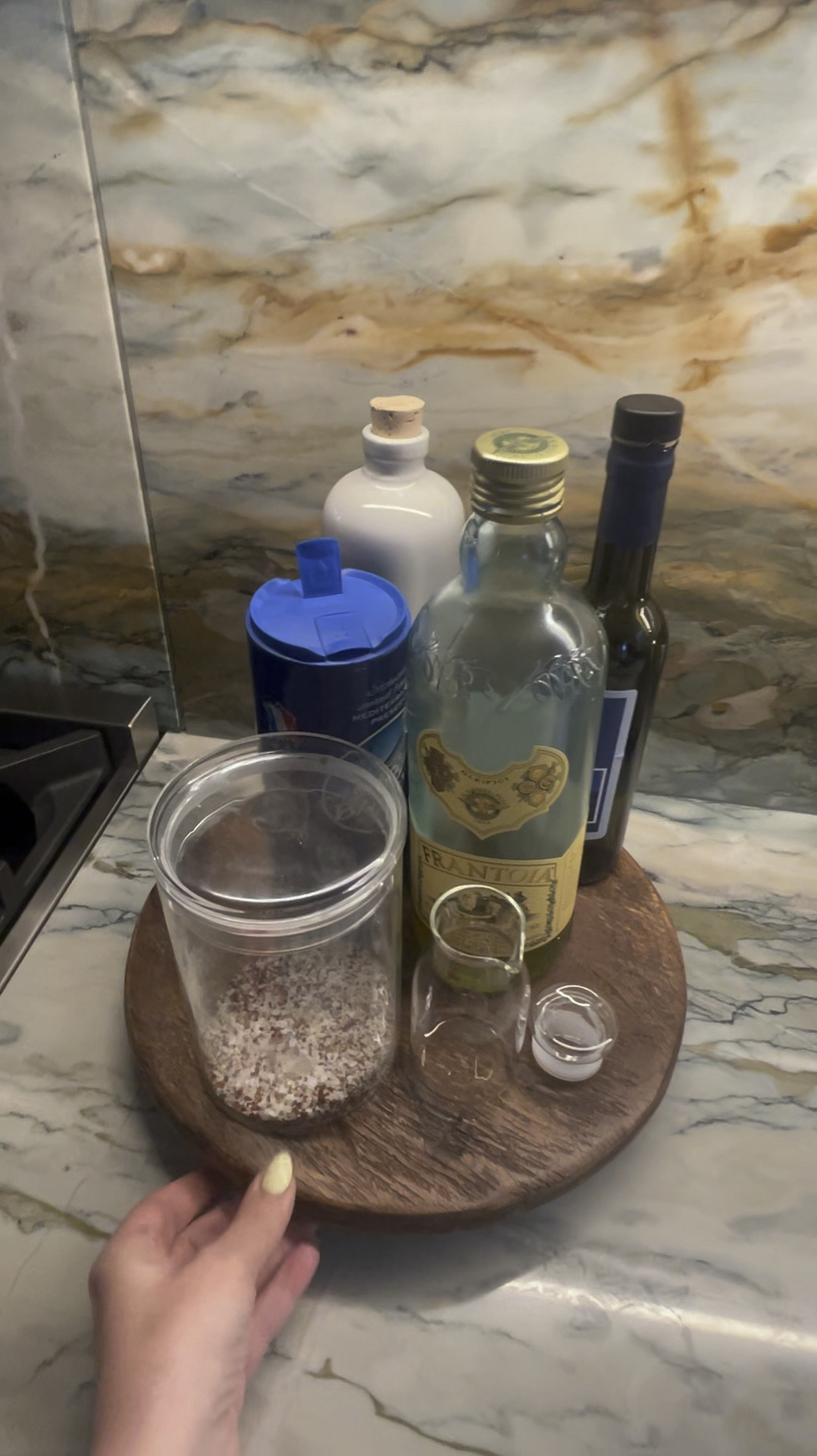 You'll never find our ESSENTIAL cooking ingredients beyond an arm's reach of the stove. For Stacie, it's all about olive oil and salt -- on a lovely tray to keep the counter looking tidy and pretty too!

#LTKHome