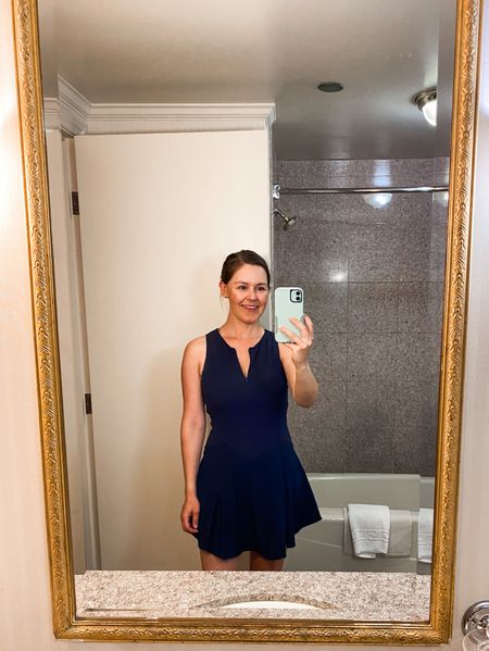 Obsessed with this active dress! The fit is so flattering and the zip front makes it nursing friendly! Has built in shorts with pockets. Super comfy and bonus it’s on sale! This is the navy color. Comes in a bunch of other colors! *Wearing size 8. (I’m usually a size 6 in their pants and 8 in sports bras). 

#postpartum #momstyle #activewear #activedress #tennisdress #nursingfriendly #breastfeeding #summerdress #lululemondress 

#LTKbaby #LTKFitness #LTKsalealert
