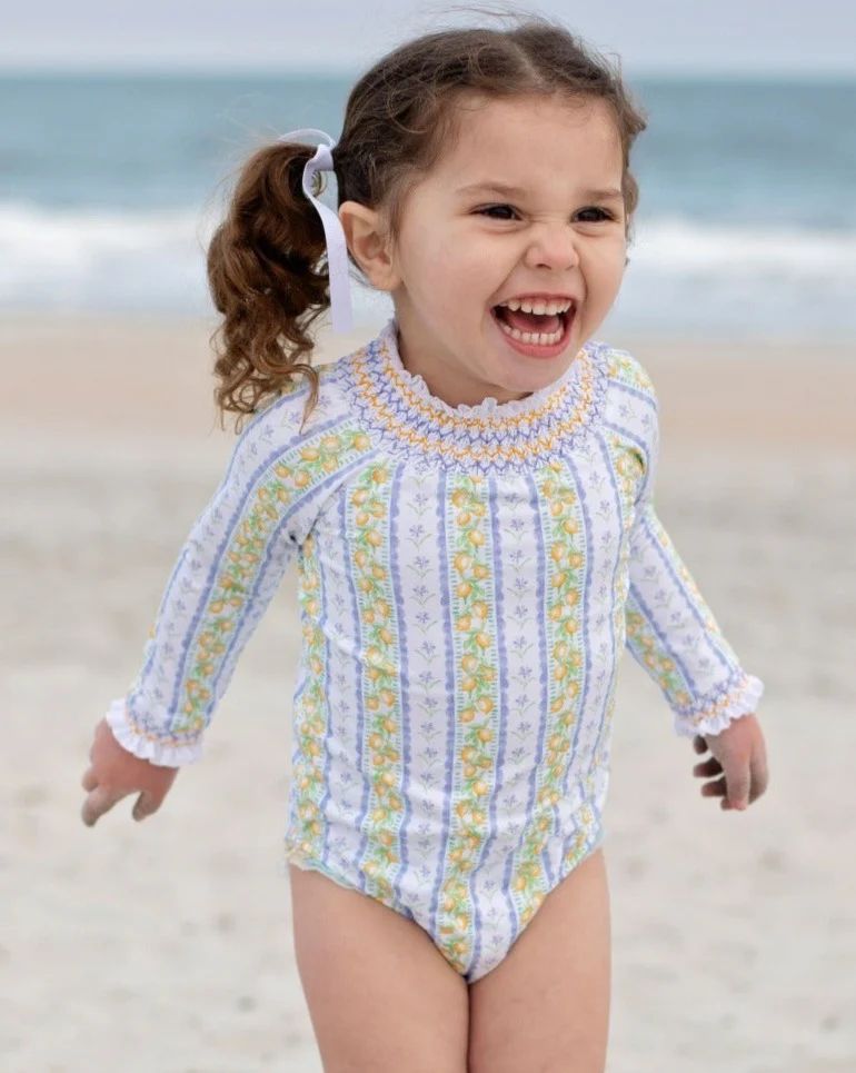 Lemon Zest Smocked Long Sleeved Rash Guard One Piece | Smockingbird Kids