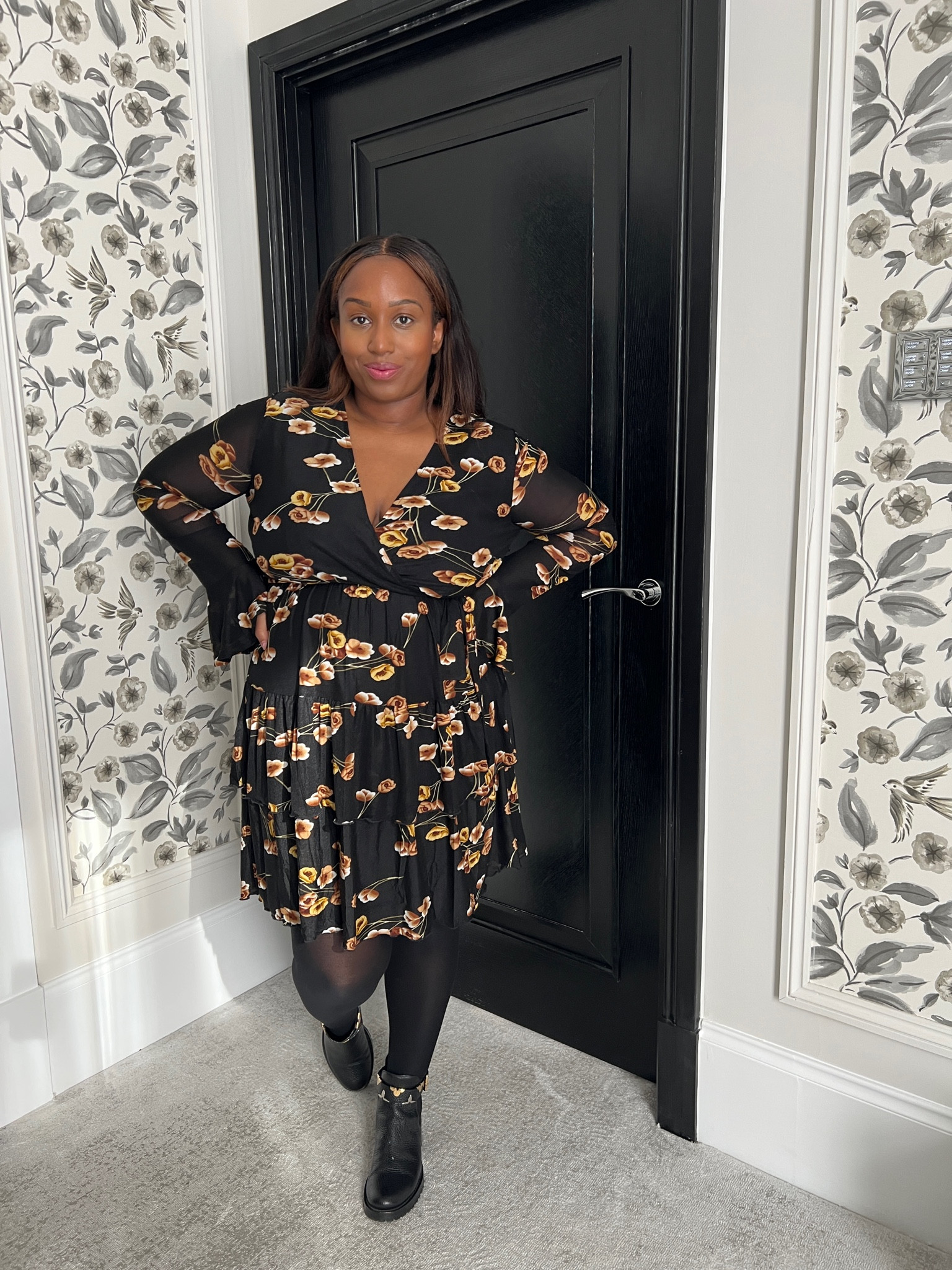 Black floral skater dress, thick black tights and black biker boots 

#LTKeurope #LTKcurves #LTKunder100