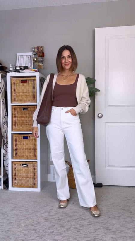 Neutral spring outfit in shades of cream and brown! I’m 5’ 7 wearing my usual size S in the tank top and shrug and my usual size 4 in the straight leg jeans. Ballet flats fit a little snug, I sized up 1/2 size The tote bag is such a good size and feels like great quality


#LTKVideo #LTKshoecrush #LTKitbag