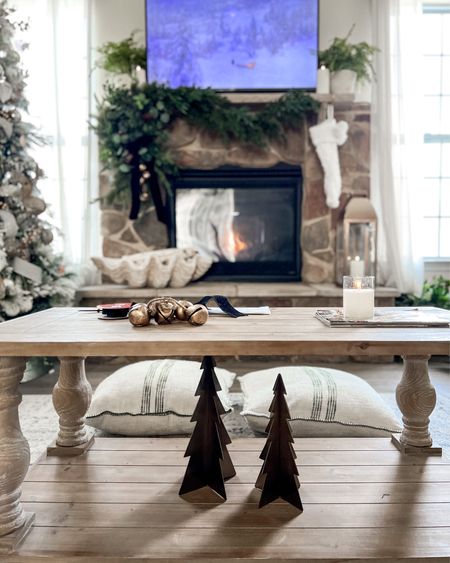 Christmas mantel styling with afloral Norfolk pine garland and stocking hooks for the holidays.

#garland
#christmasgarland
#fireplacemantel

#LTKGiftGuide #LTKhome #LTKHoliday