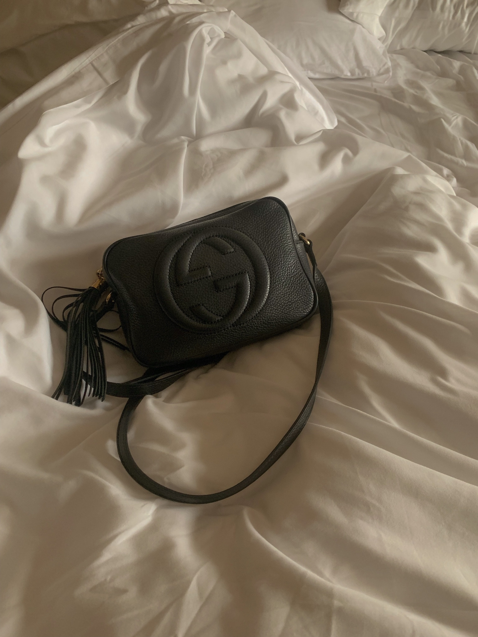 My first designer purchase. I have had this bag for 5 years now and have worn it so much! It really goes with ANY look. I love the classic black textured leather. It makes the bag feel more sturdy. The crossbody handle is a dream and the gold hardware suits it perfectly even though I’m more of a silver gal usually.

#LTKitbag #LTKstyletip #LTKFind