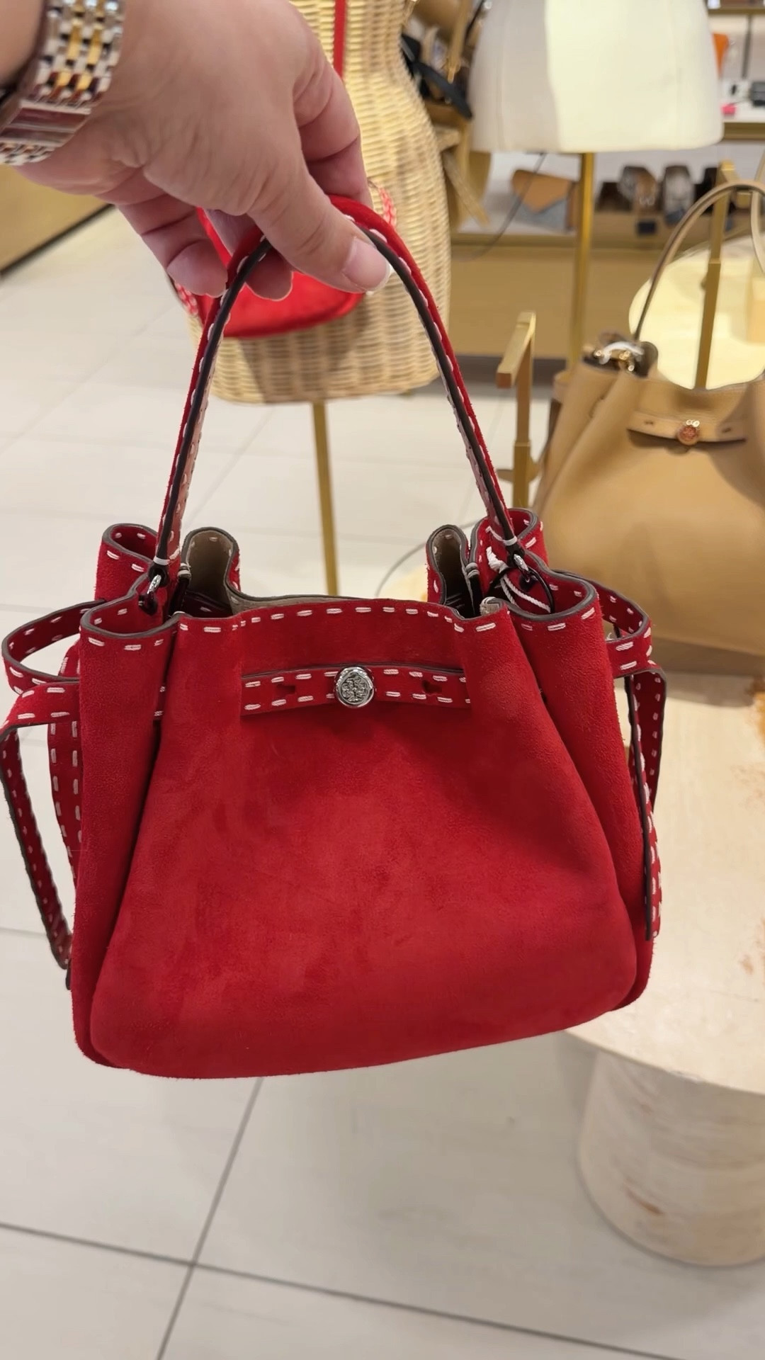 Love this Tory Burch bucket bag style that’s now available in this gorgeous red suede! Lots of other new Tory Burch bags for spring and summer available too including raffia, straw and crochet styles that are perfect for vacation outfits and resort wear. Always love the classic pebbled leather colors for everyday wear, workwear and travel outfits. 

#LTKOver40 #LTKWorkwear #LTKTravel