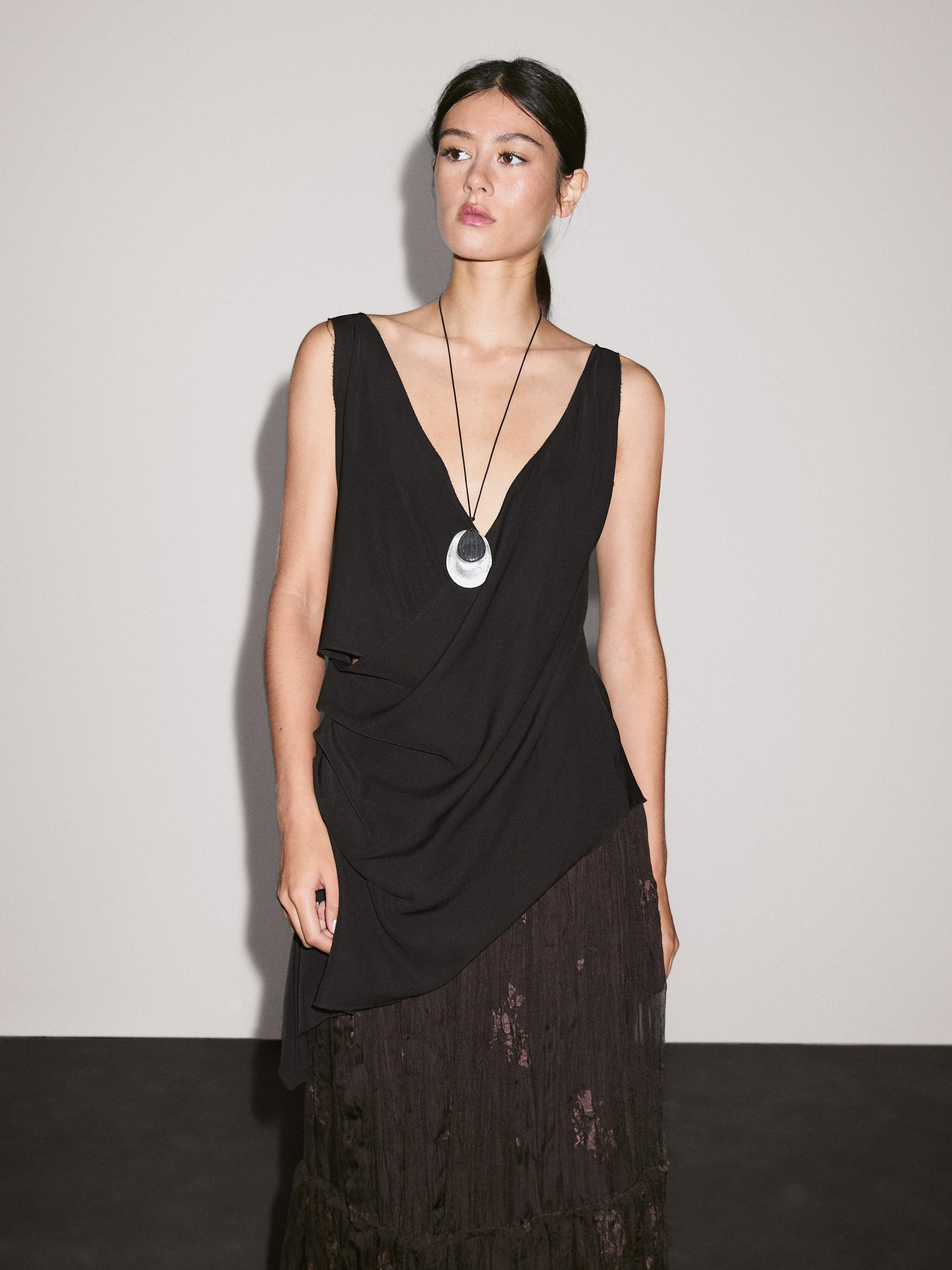 Long pleated skirt with embroidered detail | Massimo Dutti US