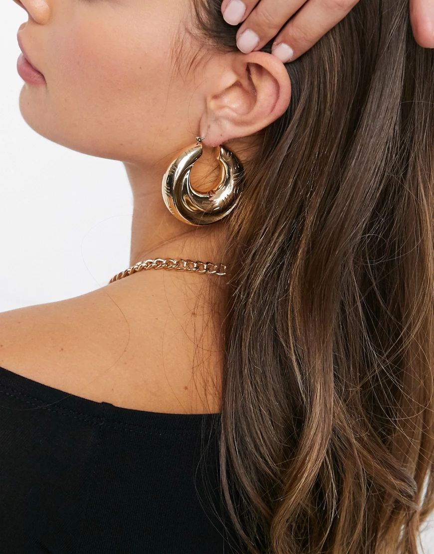 ASOS DESIGN hoop earrings in chunky soft twist design in gold tone | ASOS (Global)