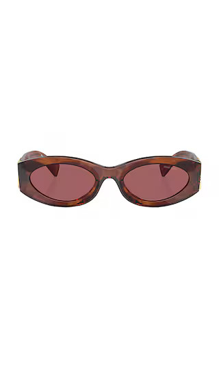 Oval Sunglasses in Striped Tobacco | Revolve Clothing (Global)