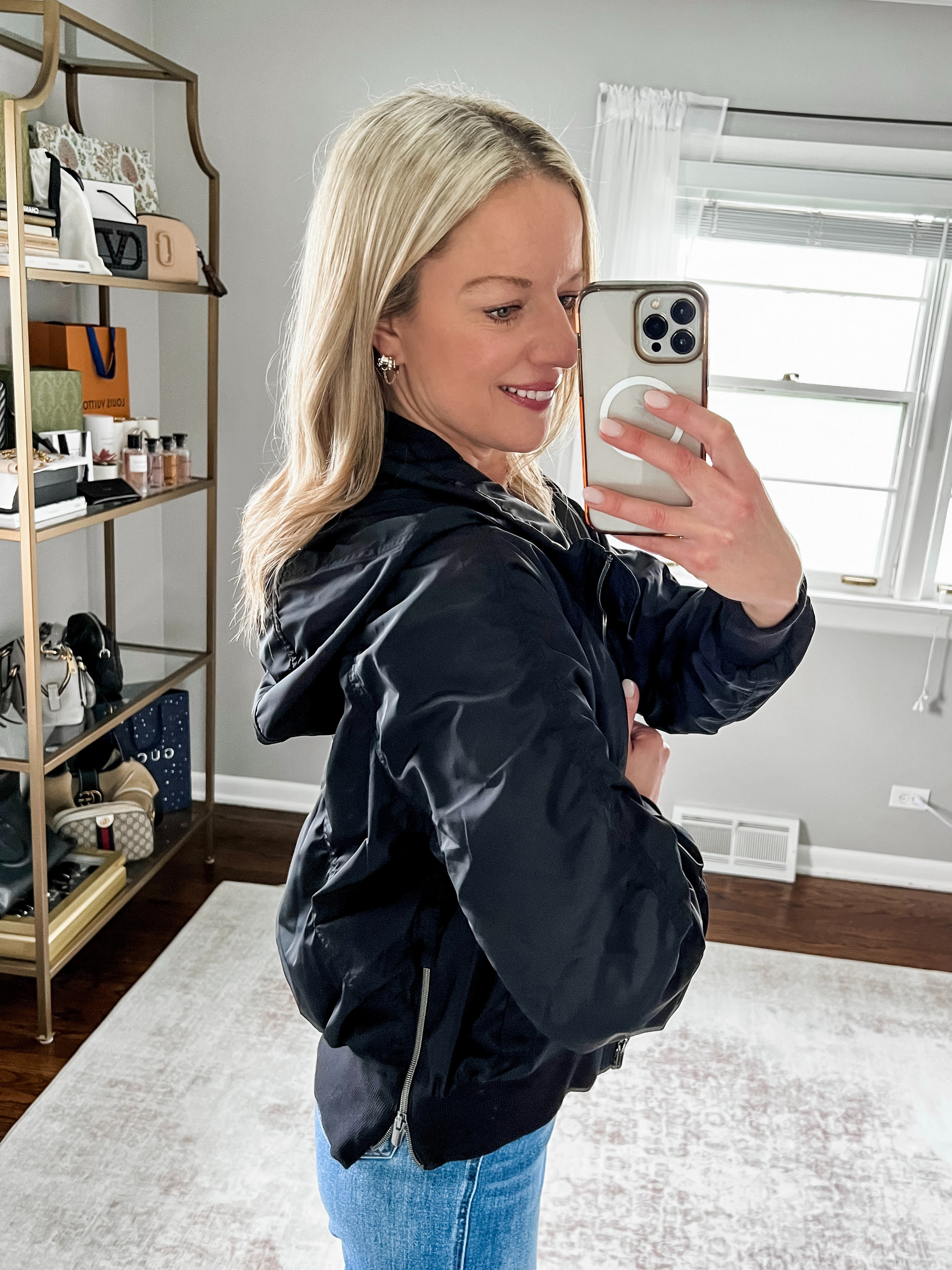 OBESESSED with this Jetset Bomber Jacket from Athleta. I am wearing a medium in the black here. 

 #LTKootd #LTKSeasonal #LTKTravel