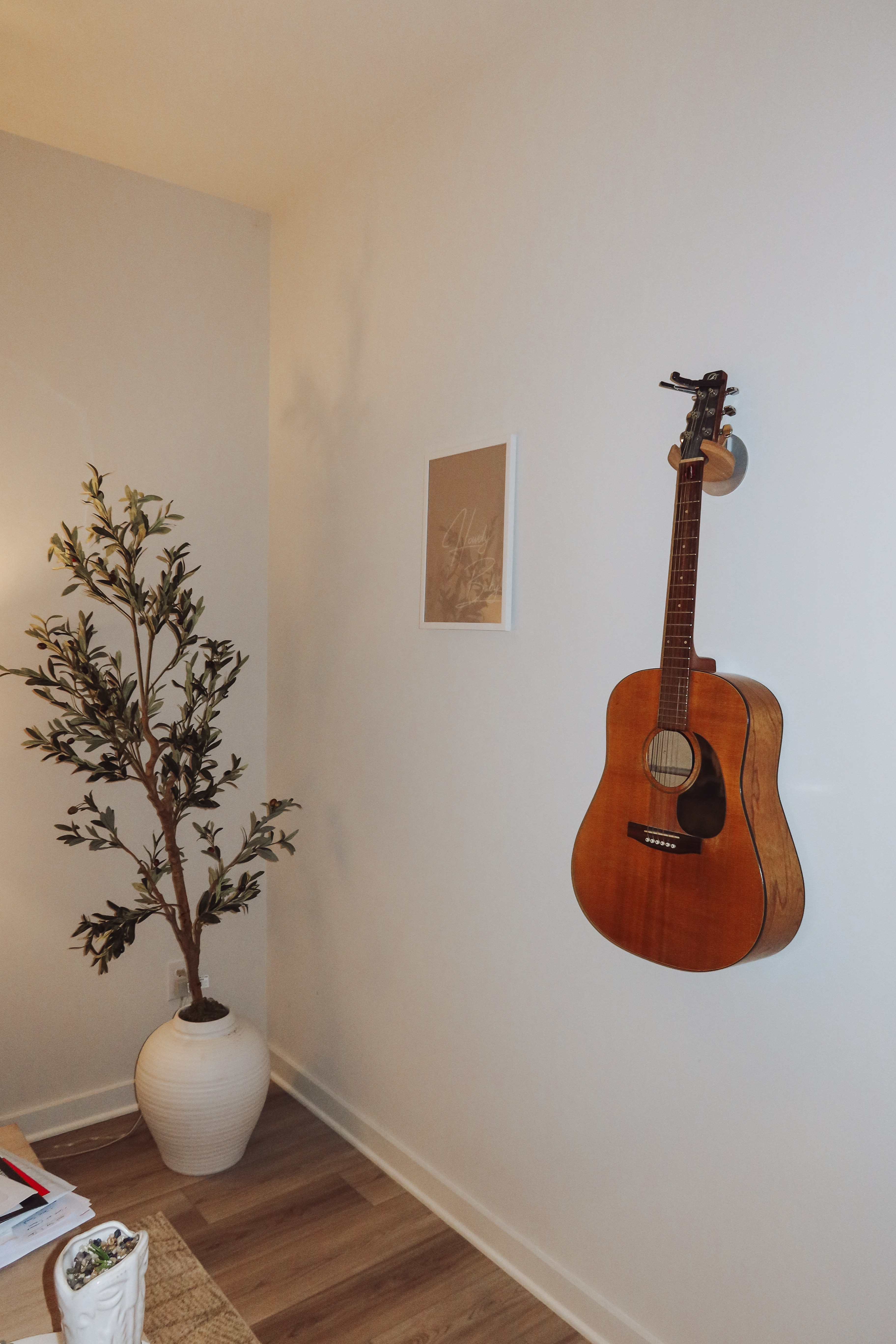 Cozy country vibes 🌿🎸 Loving this little corner with a touch of nature, rustic prints, and a hint of music. 

 #LTKHome #LTKStyleTip