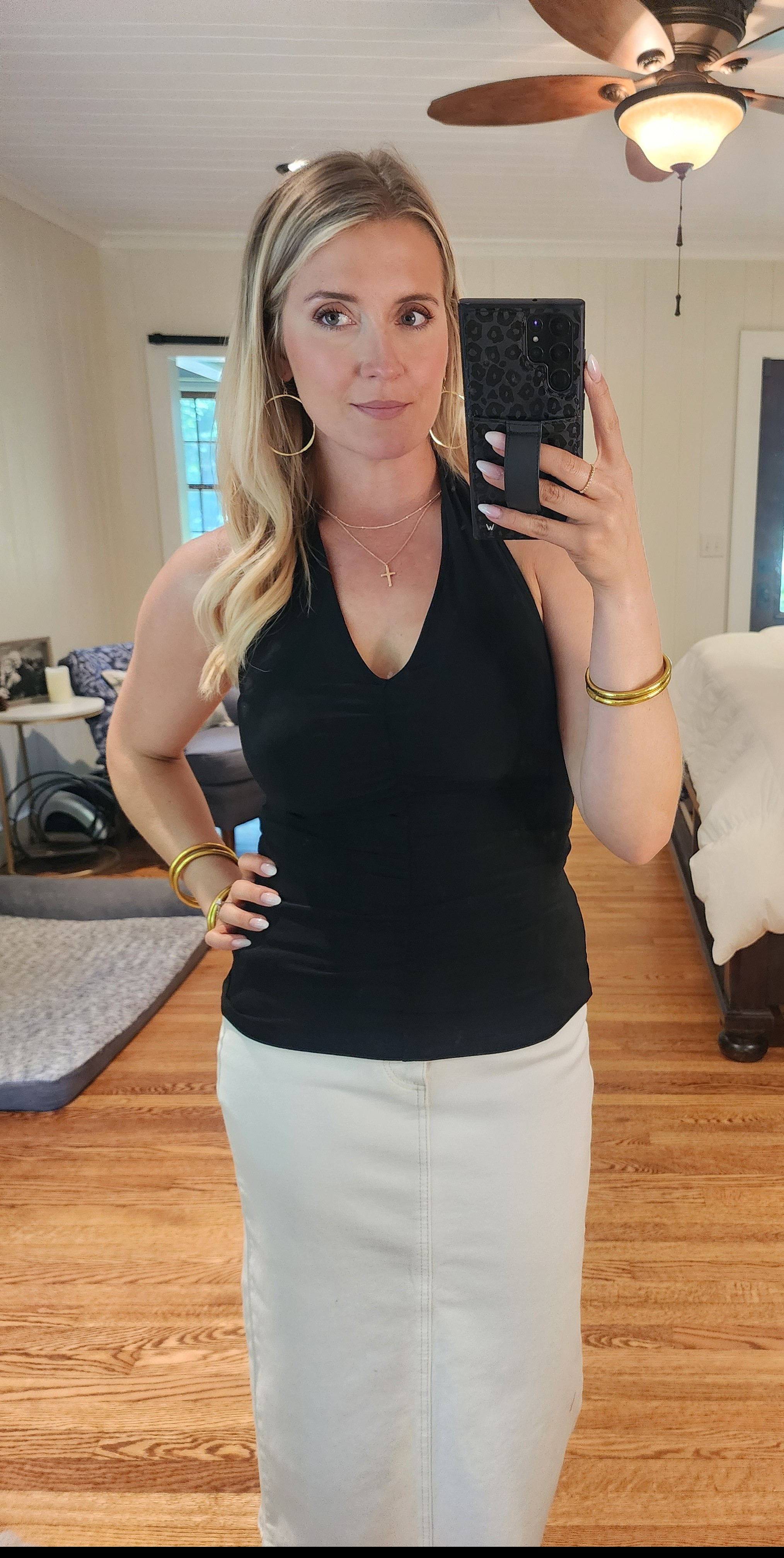 This Rouched black halter from Anthropologie fits like a dream! So flattering. I'm in a small. #Anthropologie #summertops #haltertop

#LTKFindsUnder100 #LTKSeasonal