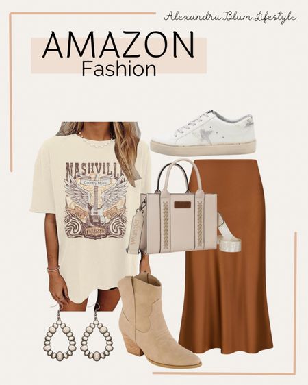 Country concert outfit idea from Amazon! Festival outfit! Western style outfit! Nashville outfit! Nashville country graphic t shirt, satin maxi skirt, short western booties, star white sneakers, and a cream western style tote bag! Amazon fashion! Amazon finds! Amazon trends! 

#LTKitbag #LTKfindsunder50 #LTKshoecrush