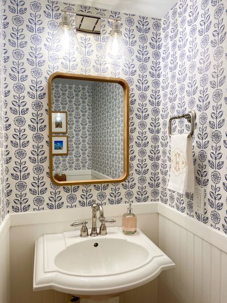 Our DIY powder room remodel -– removable floral wallpaper, budget friendly mirror with wood accent light fixture, monogrammed personalized hand towel from small shop polished nickel towel ring & faucet.

Guest bathroom design inspiration. Blue and white bathroom update.


#LTKfindsunder100 #LTKhome