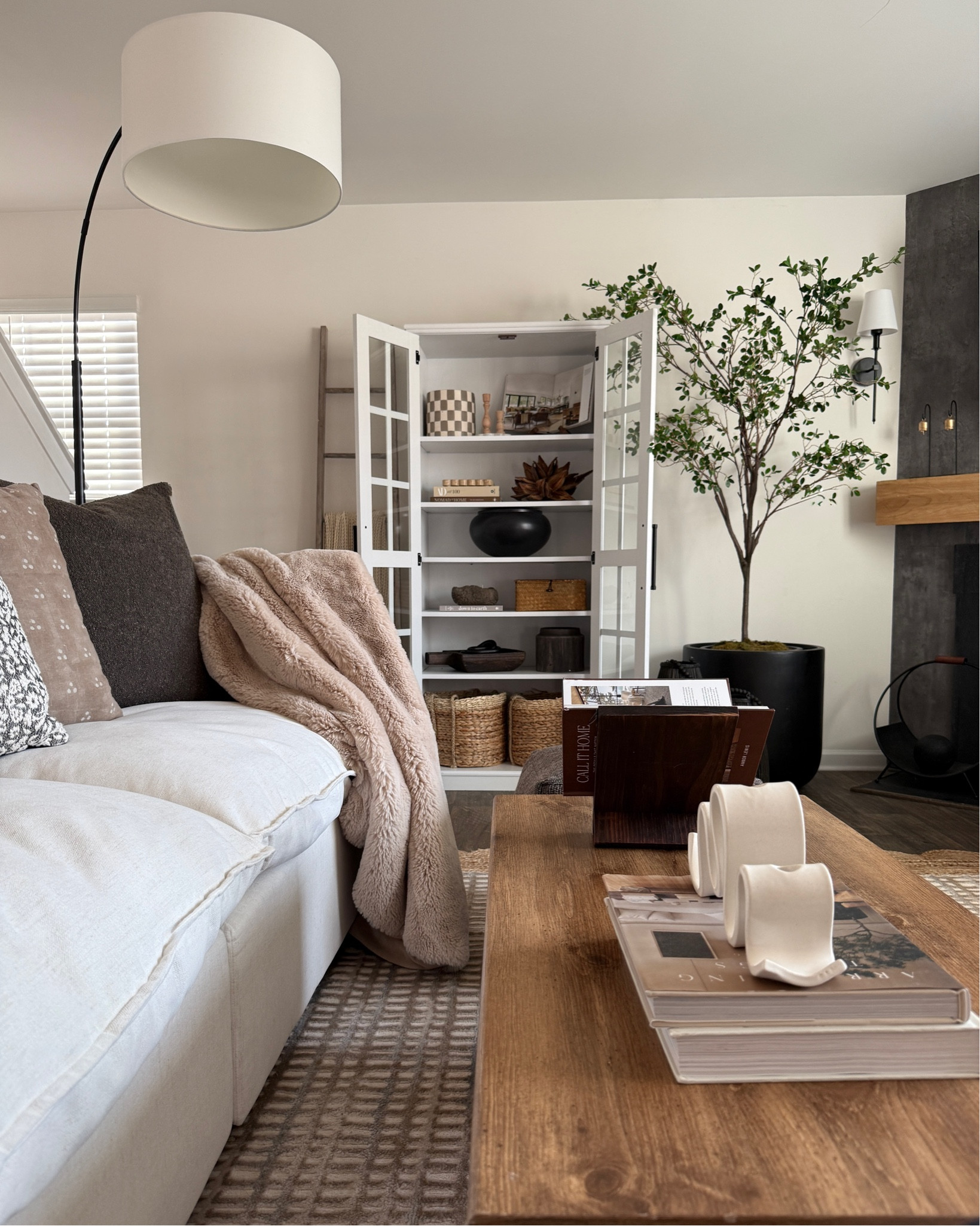 Living room refresh and new cabinet styling finds!
Bookshelf decor, rustic modern home decor, coffee table decor, washable sofa, performance fabric, citrus tree, curio cabinet 

#LTKSaleAlert #LTKMostLoved #LTKHome