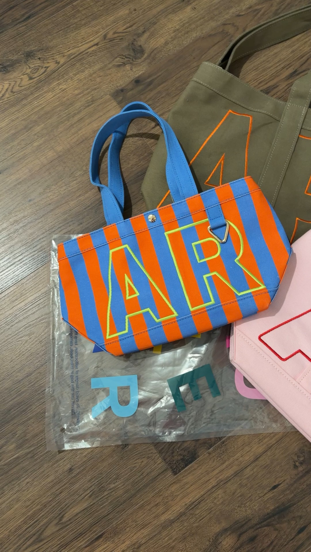 Bags I am loving. - stripe size small. Pink size medium. - green size large  

#LTKMothersDay