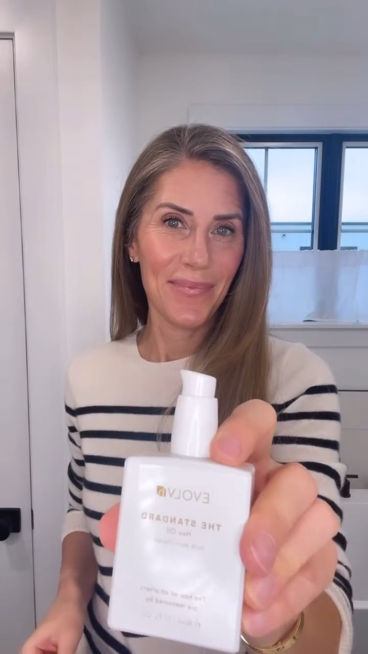 🌟 One of my healthy hair secret weapons is The Standard Hair Oil by EVOLVh🌟

This nontoxic formula helps keep my hair strong, smooth, and shiny💧✨

Benefits of The Standard Hair Oil:

💜 Moisturizes & repairs dry hair (Ceramide NG restores up to 82%)
💜 Tames frizz & flyaways (Citropol reduces frizz by up to 58%)
💜 Adds shine (Castor Oil Esters boost shine by up to 428%)
💜 Leaves hair silky-smooth without the grease
💜 Protects against heat (up to 450°F) & UV damage
💜 Keeps color-treated hair vibrant 🌈
💜 Designed for all hair types

Best of all? It’s silicone-free, clean, and made with non-toxic ingredients like Ceramide NG, Olive Fruit Oil, and Rosemary Leaf Extract and Castor Oil.

All EVOLVh products are:

• SULFATE-FREE • PARABEN-FREE 
• PHTHALATE-FREE • PROPYLENE GLYCOL-FREE • SILICONE-FREE • GLUTEN-FREE 
• FREE OF SYNTHETIC FRAGRANCE • GMO-FREE • CRUELTY-FREE • VEGAN

If you’ve been looking for a hair oil that actually works—and keeps your hair healthy from the inside out—this one of my particular favorite. 🌿✨

#HealthyHair #NontoxicBeauty #HairCareRoutine #CleanHairCare #FrizzFreeHair #HairGoals

#LTKBeauty