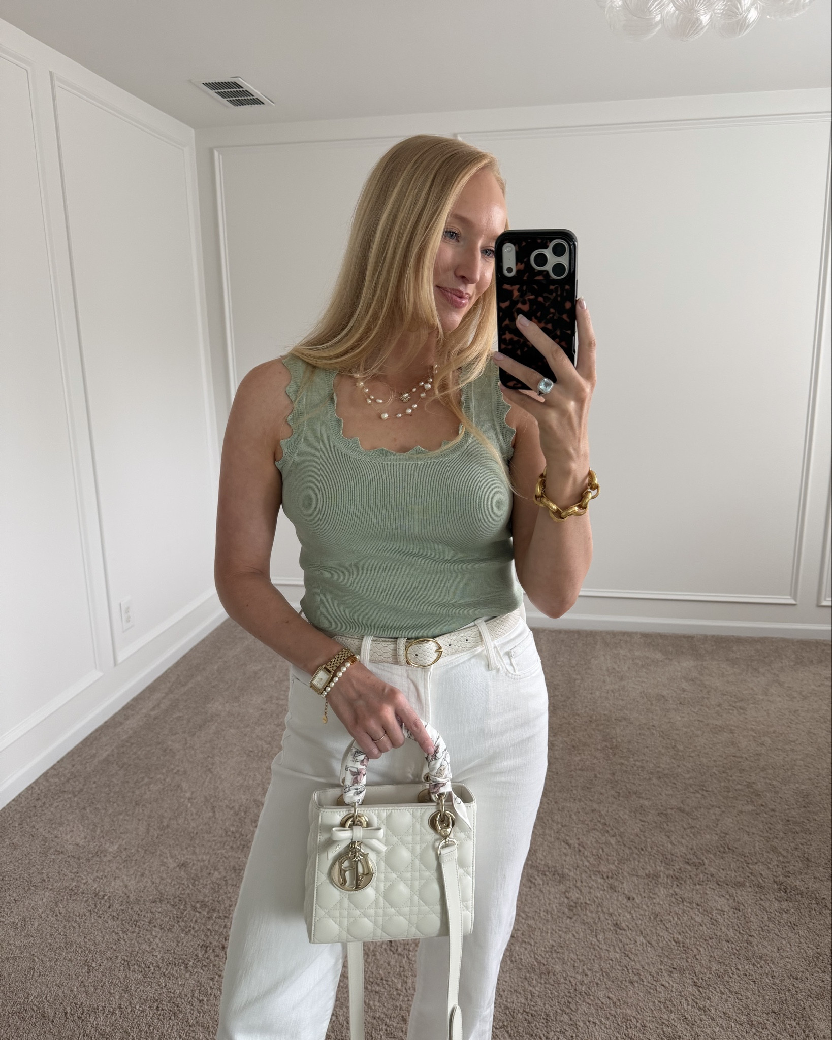 This Amazon tank is on sale for $14 and comes in multiple colors + ships prime if you need a last minute option for st. Patrick’s day. Wearing a small and it’s very stretchy!