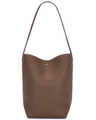 The Row Medium N/S Park Tote in Dark Olive PLD | FWRD | FWRD 