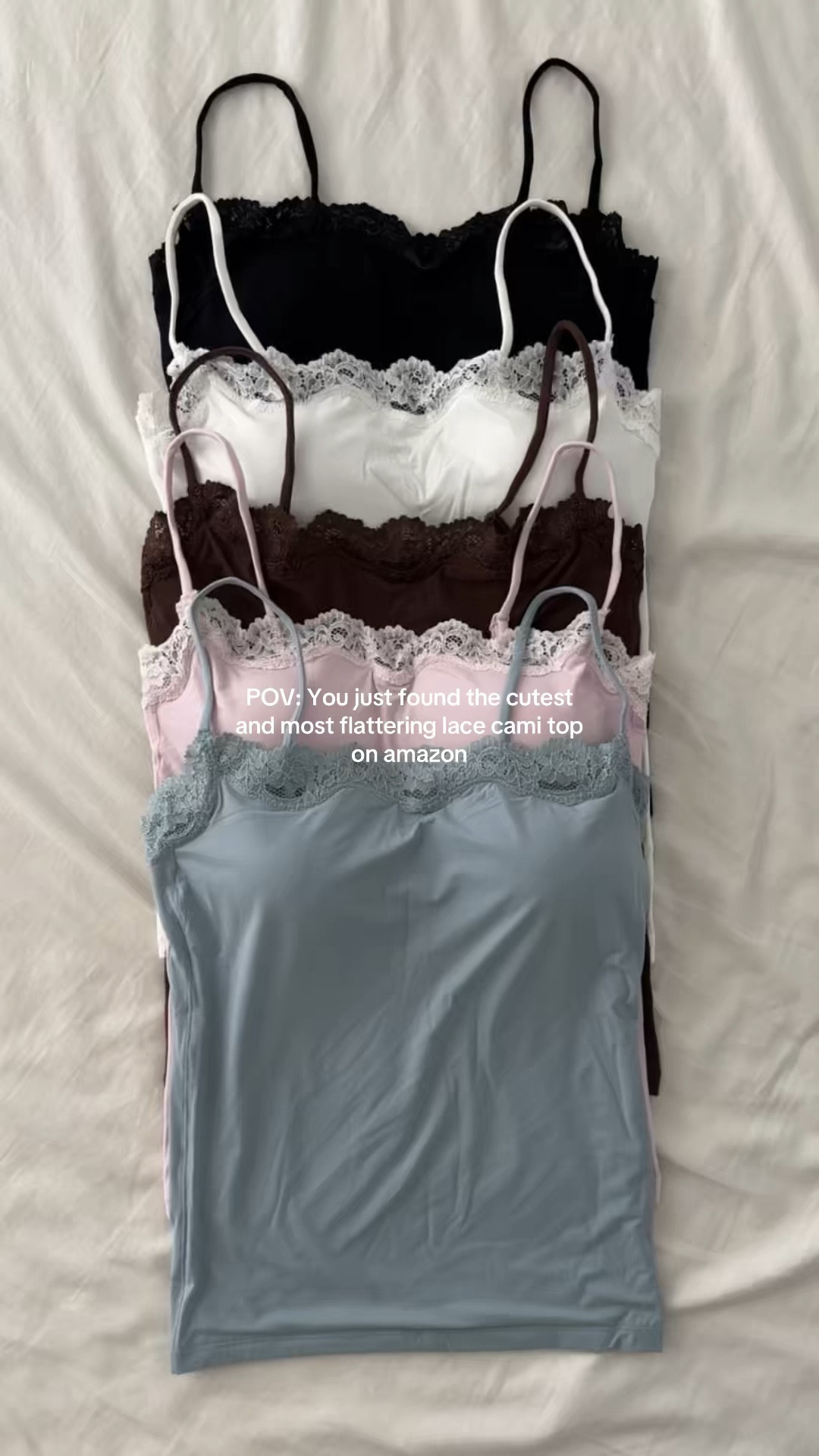 POV: You found the most flattering & cutest lace cami top on Amazon ✨ This dainty lace tank is giving elevated basics, perfect for layering under chunky knits or rocking solo with your favorite Levi’s. The buttery-soft fabric and delicate lace details make it the ultimate go-to for cozy winter looks. Soft, comfy, and effortlessly chic—this is the winter wardrobe essential I’m reaching for nonstop! 🖤

#LTKCyberWeek #LTKStyleTip #LTKFindsUnder50