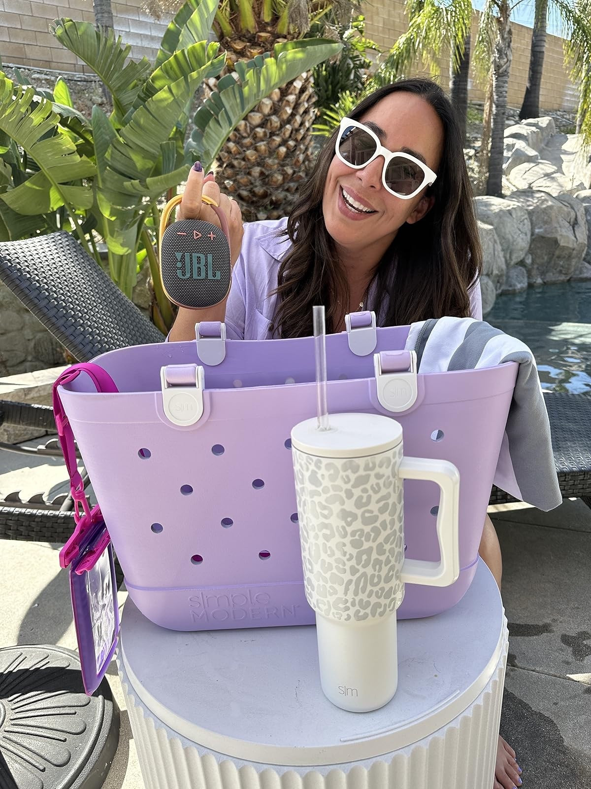 I’ve had this large rubber bag for over a year and use it for pool days and beach trips all the time. The size is perfect to take all the essentials and it comes in so many colors. I love this white leopard tumbler and this colors on this clip on Bluetooth speaker are so cute and unique. 
Beach trip must haves, summer must haves

#LTKOver40 #LTKSeasonal #LTKmomlife