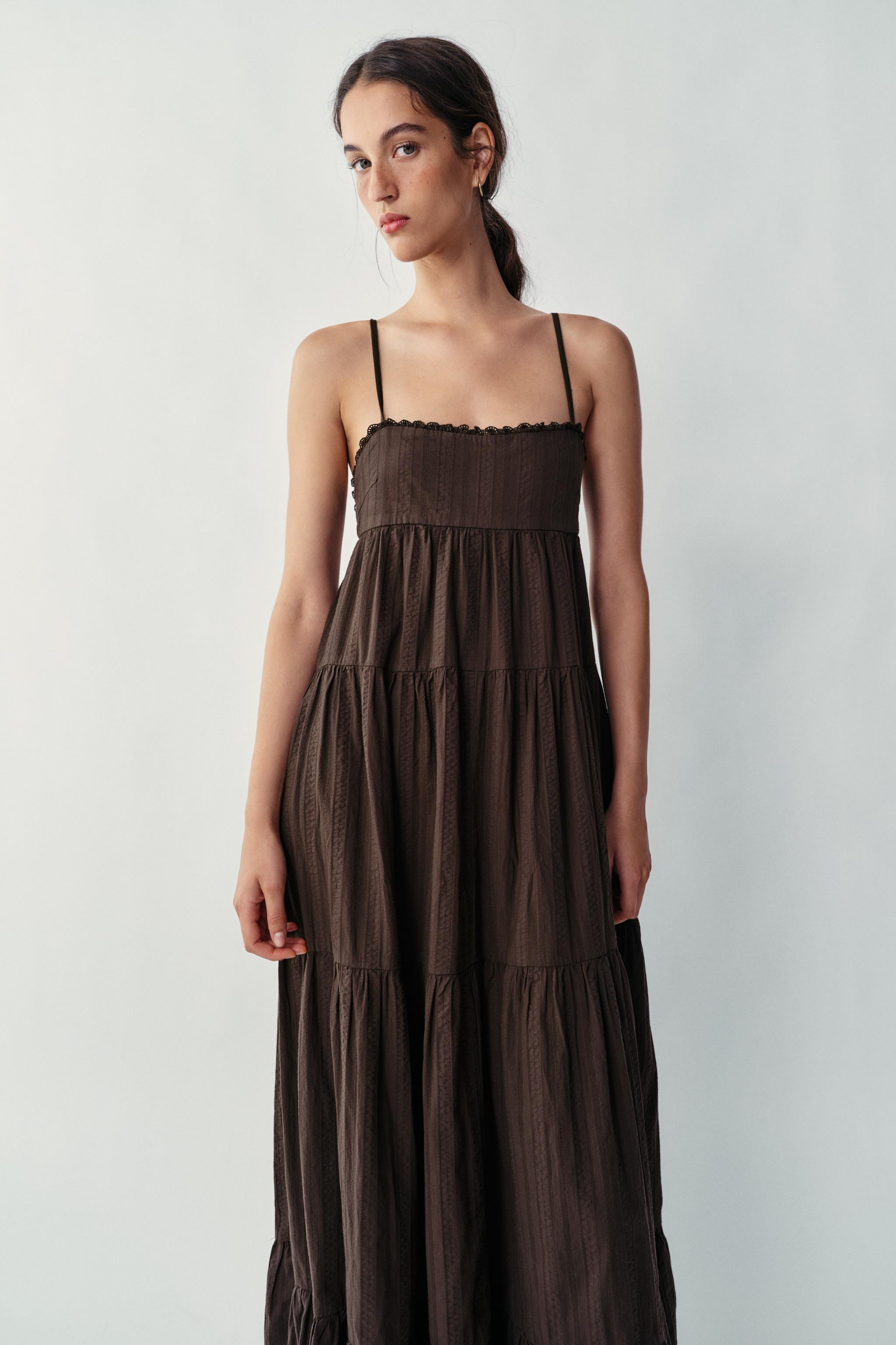 Model height: 183 cmStraight-neckline dress featuring lace trim and thin adjustable straps that t... | Zara UK