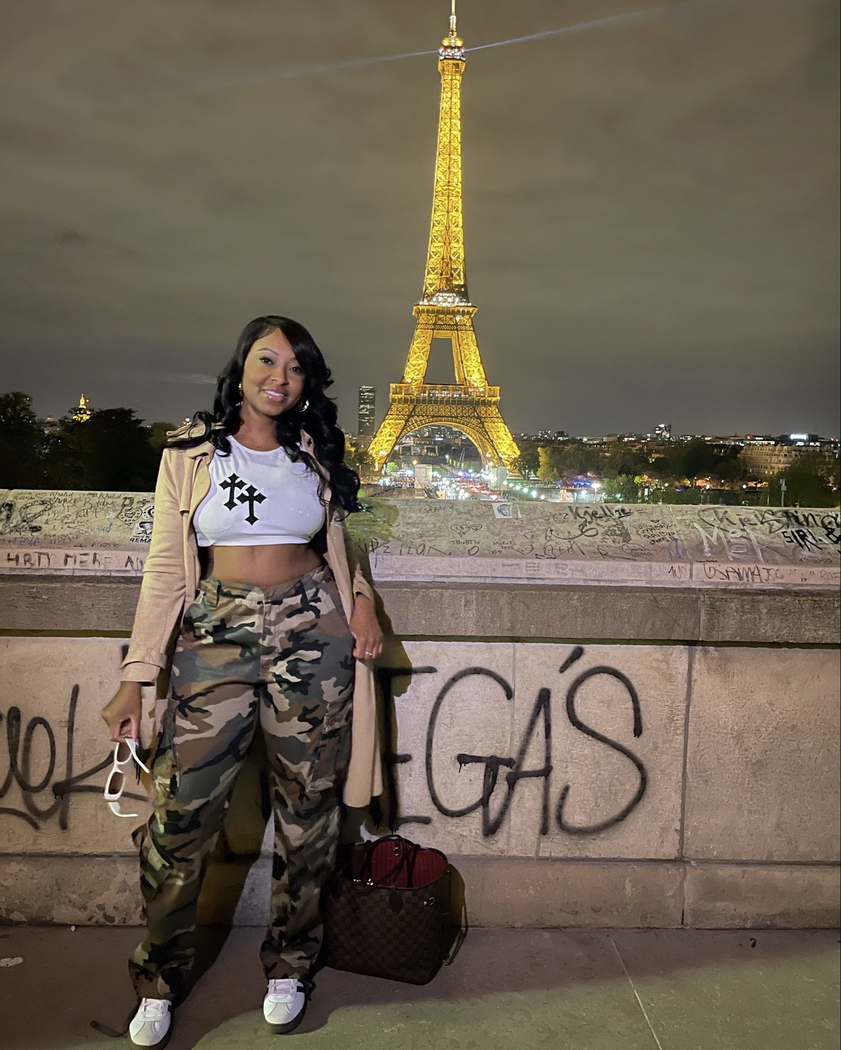 Paris nights just hit different ✨
Styled this comfy-chic travel look for walking the city and taking in the views.

Linked my full outfit — including my cargo pants, crop top, coat, sneakers, and travel bag — in case you’re planning a trip or just want effortless street style.

Everything is comfy, flattering, and easy to mix + match @applebaz 

#LTKootd #LTKOver40 #LTKTravel