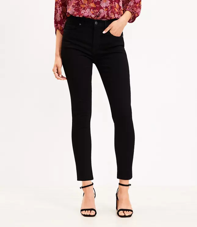 Mid Rise Skinny Jeans in Black | LOFT