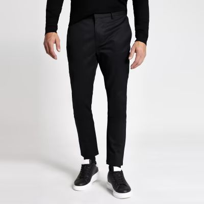 Black skinny chino trousers | River Island (UK & IE)