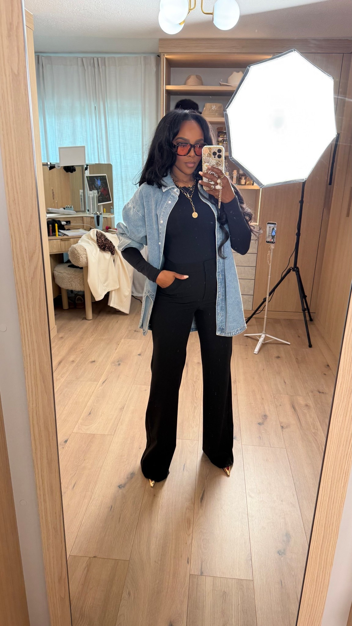 Clean, effortless layers — these @express flare trousers instantly polish the look while the Amazon basics keep everything comfortable and elevated. Throwing on an oversized denim shirt adds that cool, off-duty vibe without losing the chic monochrome base.

Perfect for casual office days, errands with style, or a polished weekend look.

📏 Sizing:
Trousers (@express): 4 Long  
Bodysuit: Small  
Denim shirt: Medium  
Shoes: TTS  

Tap to get details — every piece is linked for you.

Chic black outfit ideas, flare trousers styling, Amazon essentials outfit, denim shirt layered look, elevated everyday outfits for fall and winter.

Follow me on Instagram and YouTube @kirasfashionfinds

#LTKootd #LTKgrwm