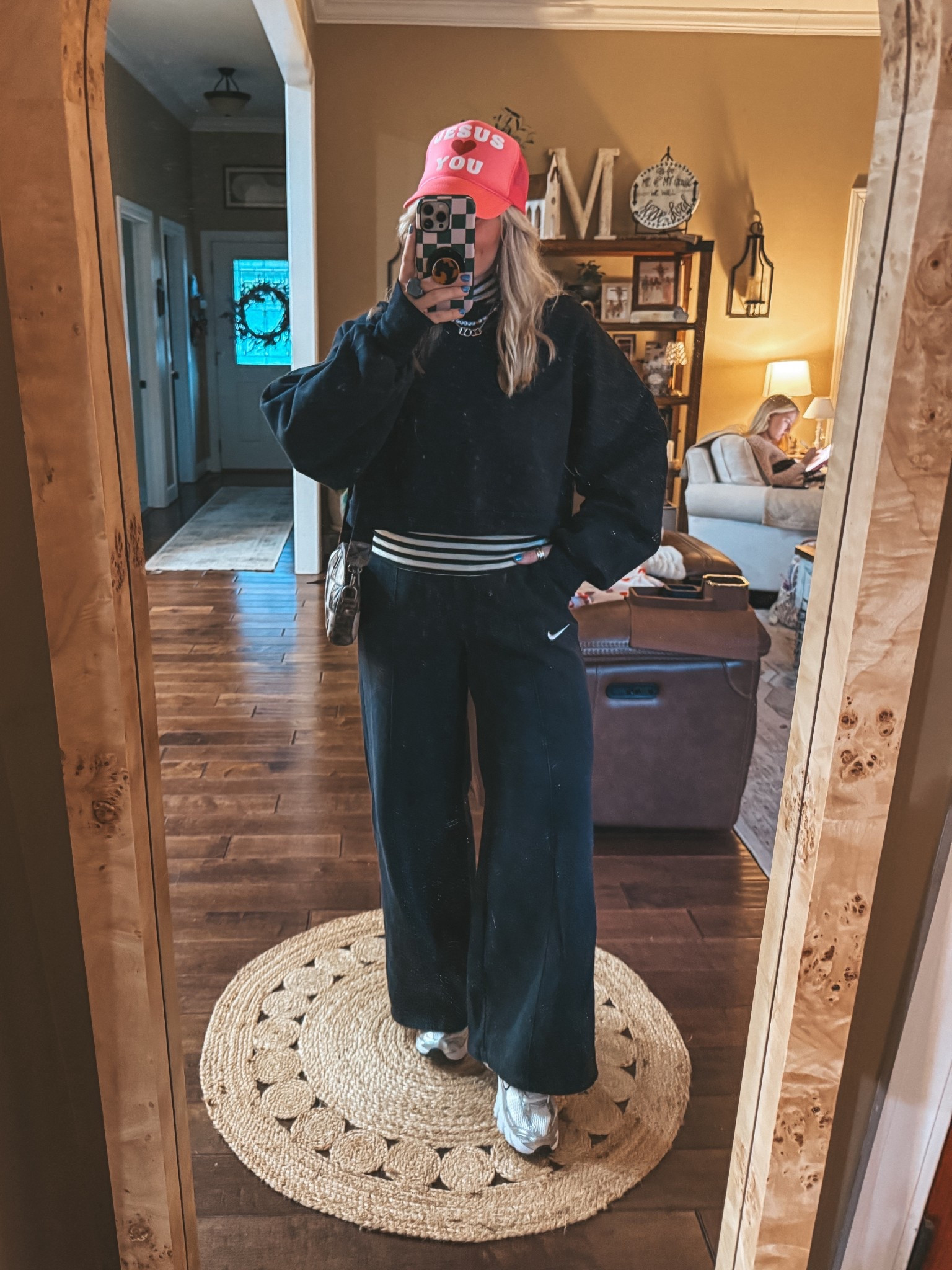 Saturday fit 🖤 
Cozy and warm with this cute off shoulder sweatshirt layered over my fav striped turtleneck. Also love my wide leg Nike sweatpants  

#LTKOver40 #LTKootd #LTKgrwm