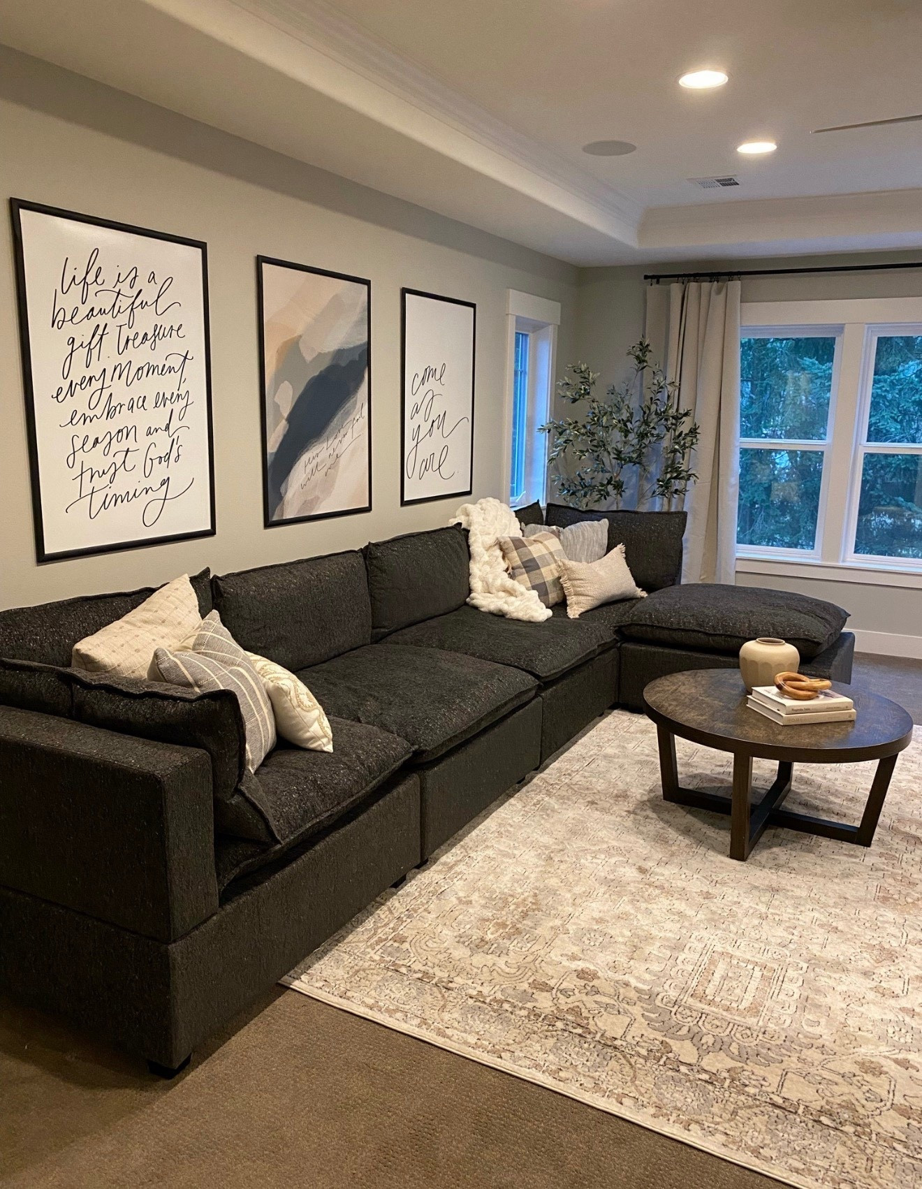 Bonus room transformation ✨ 

New modular charcoal sofa from Albany Park, neutral Loloi rug, amazon beige curtains with extended length black curtain rod  

#LTKSaleAlert #LTKHome #LTKmomlife