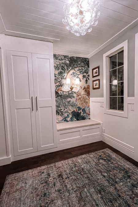 Entryway.  Area rug. Washable rug. Wallpaper. Lights. Chandelier. Bubble light. Sconce. Hardware. Cabinetry. Bench. Cushion. Mill work. 

#LTKhome