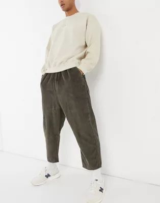 ASOS DESIGN drop crotch cord trousers in washed brown | ASOS (Global)