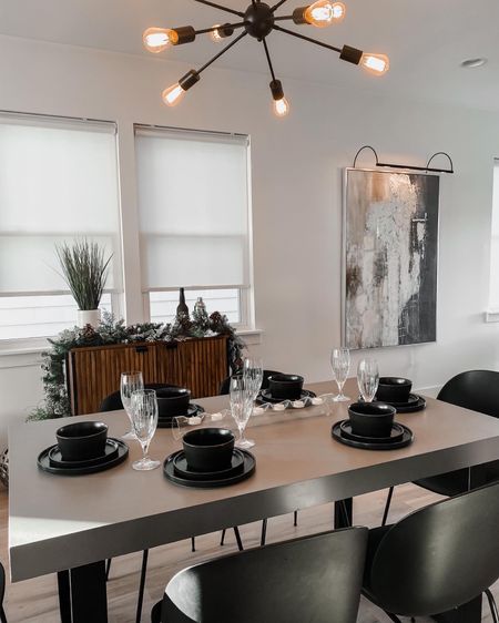 Matte black dinnerware set and ribbed water glasses on concrete dining table with round back modern chairs

#LTKsalealert #LTKhome #LTKstyletip