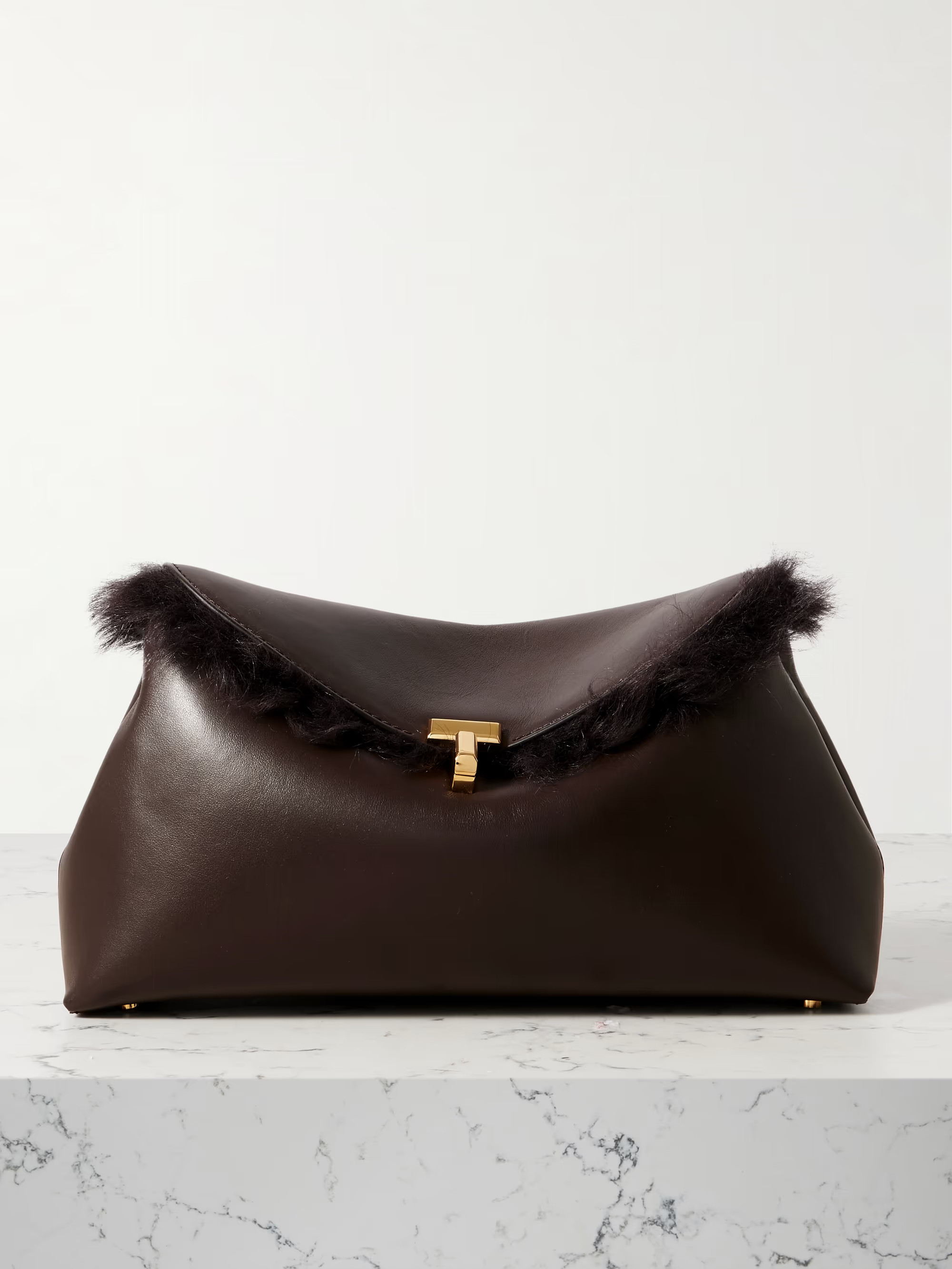 T-Lock shearling clutch | NET-A-PORTER (US)