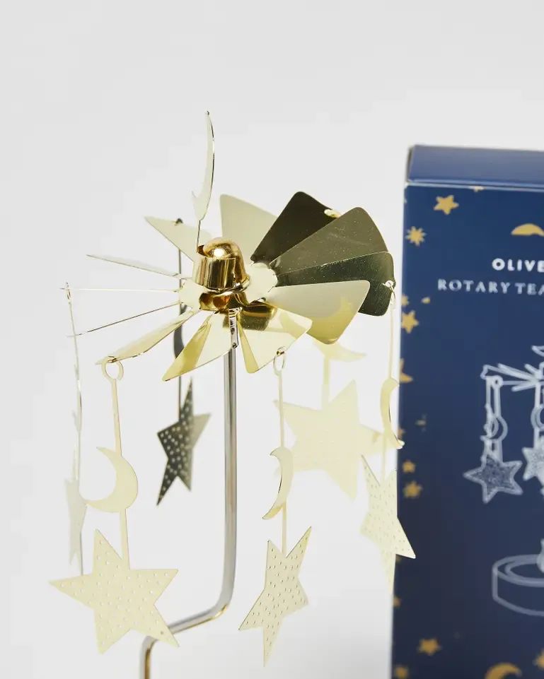 Moon & Star Rotary Gold Tea Light Holder | Oliver Bonas (Global)