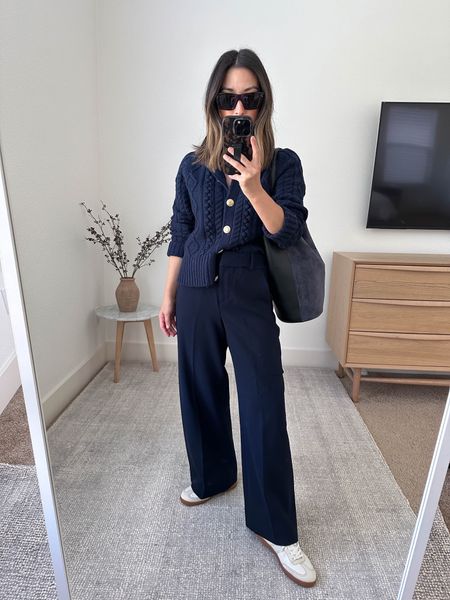 J.crew cableknit in navy. So good I have it in 2 colors. Also, these ar me the Sydney trousers in the regular length which work perfect for petites. Sized up to 2, but could wear the 0. 

J.crew cardigan small
J.crew Sydney trousers regular 2 
J.crew sneakers 5 
J.crew bucket bag 
YSL sunglasses  

Fall outfits, fall style, workwear, petite style 

#LTKSeasonal #LTKshoecrush #LTKitbag