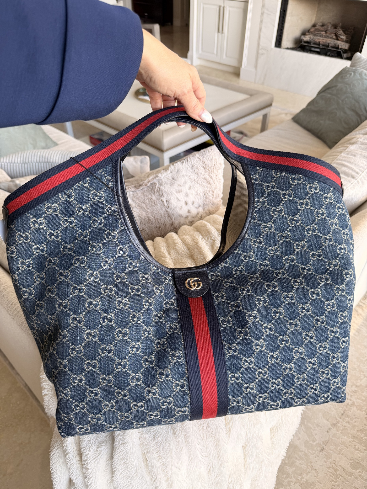 Loving this denim Gucci bag 💼 

#LTKgrwm #LTKOver40 #LTKootd