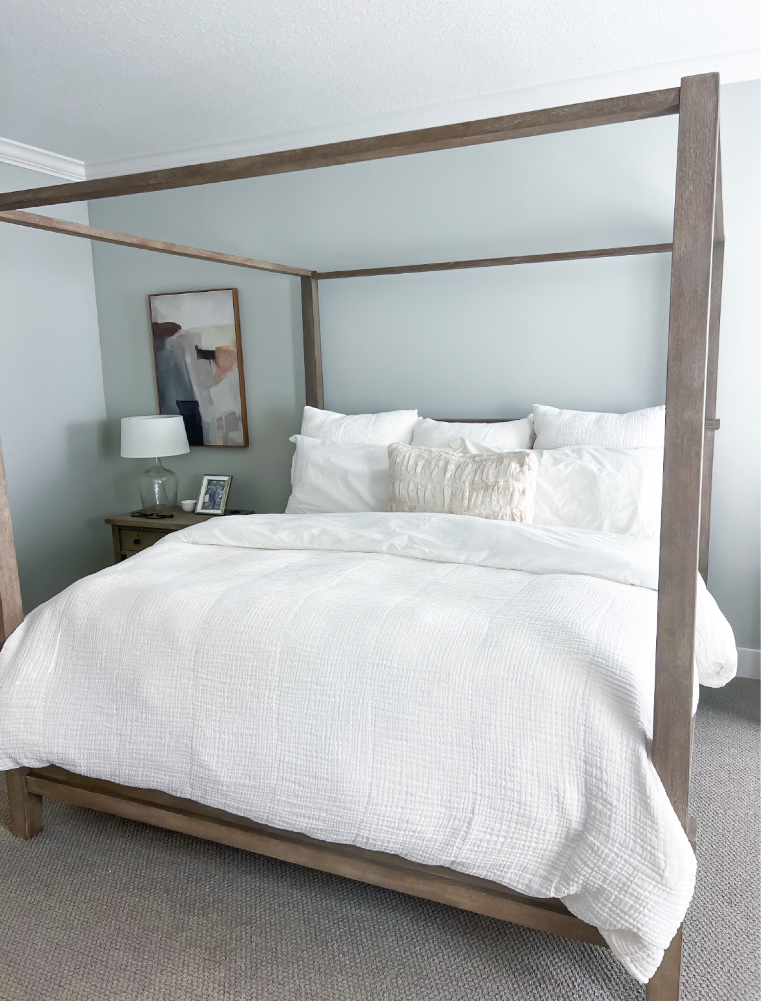 Bedroom inspo. Pottery Barn canopy bed (king, gray wash). Pottery barn bedding. White bedding. Coastal home. Pottery Barn cloud duvet. Pottery barn duvet insert (light). Also linking our dresser and nightstand - we switched out the knobs on night stand to match the dresser! Both are gray wash color. Target lamps. 

*Our bed is 8 years old and still in Amazing condition!!

#LTKMostLoved #LTKhome #LTKfamily